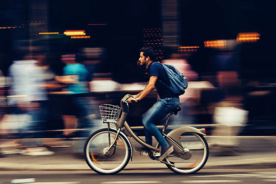 A helicopter flying over waterDescription automatically generated with medium confidence